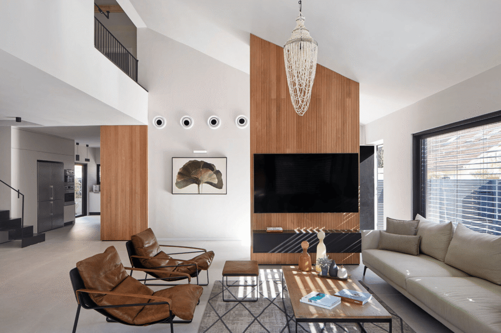 Modern open-concept living area displaying Contemporary interior design style with clean structural lines, sleek surfaces, and minimalist architecture